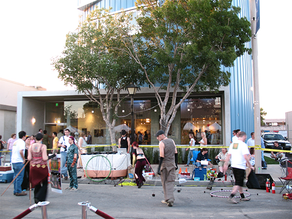 Arbor Artist Lofts during a street festival (courtesy of PSL Architects).