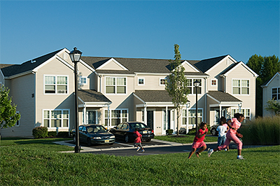 Children running on the grounds of Ethel R. Lawrence Homes in Mount Laurel Township, New Jersey.