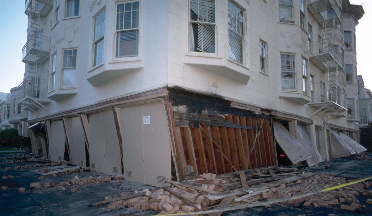 A building that collapsed at the point where the ground floor support was weak.