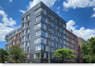 Exterior image of an eight-story apartment building.