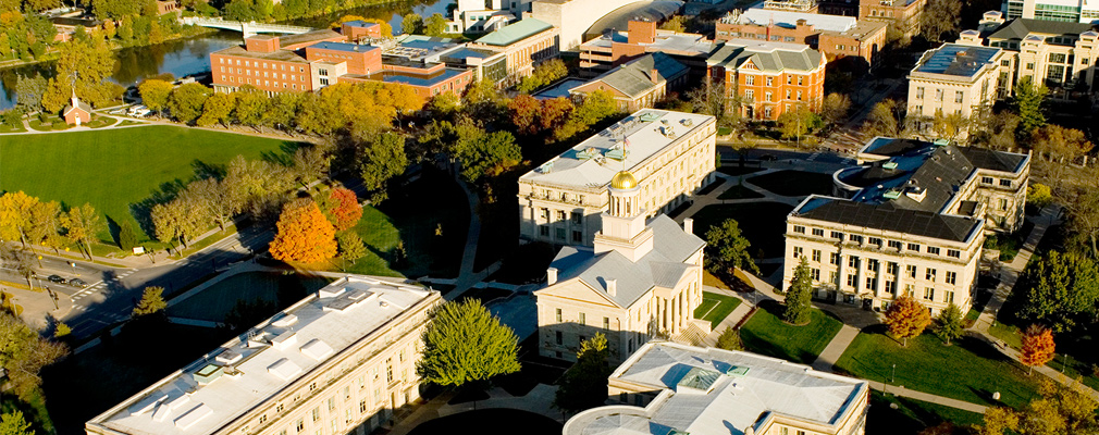Low altitude aerial photograph of the Old Capitol surrounded by four other institutional buildings.