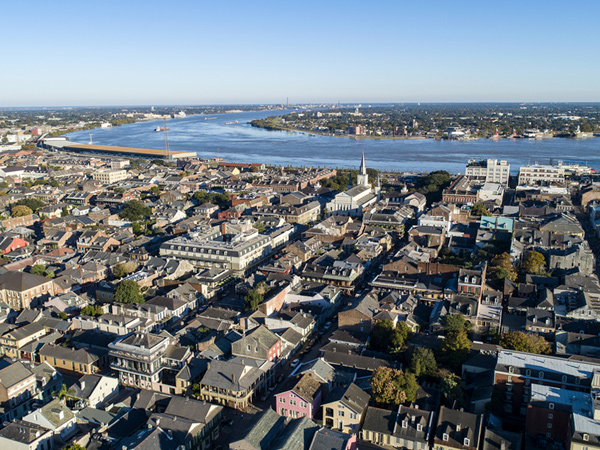 Aerial view of the city of New Orleans, Louisiana showing the historic French Quarter and the Mississippi River.