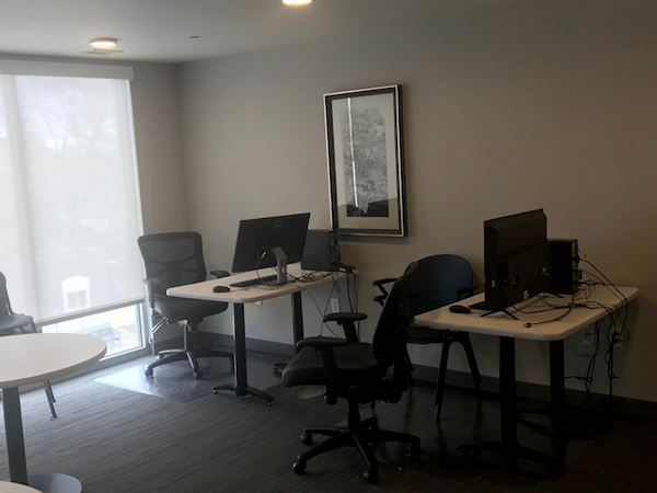 Photograph of a computer lab room at The Atlantis Apartments.