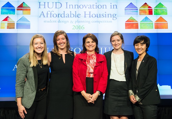 HUD Deputy Secretary Nani Coloretti poses with the winners of the 2016 Innovation in Affordable Housing competition.