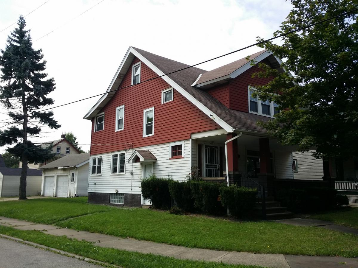 Photograph of a two-story single-family detached home. 