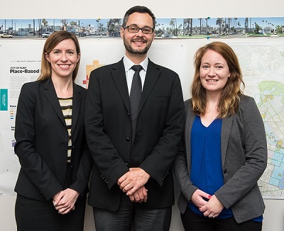Image of Patrick J. Pontius (center), Executive Director for the White House Council on Strong Cities, Strong Communities (SC2); Kate Dykgraaf (right), Senior Program Manager for the SC2 National Resource Network; and Kate Reynolds (left), Deputy Director for SC2.