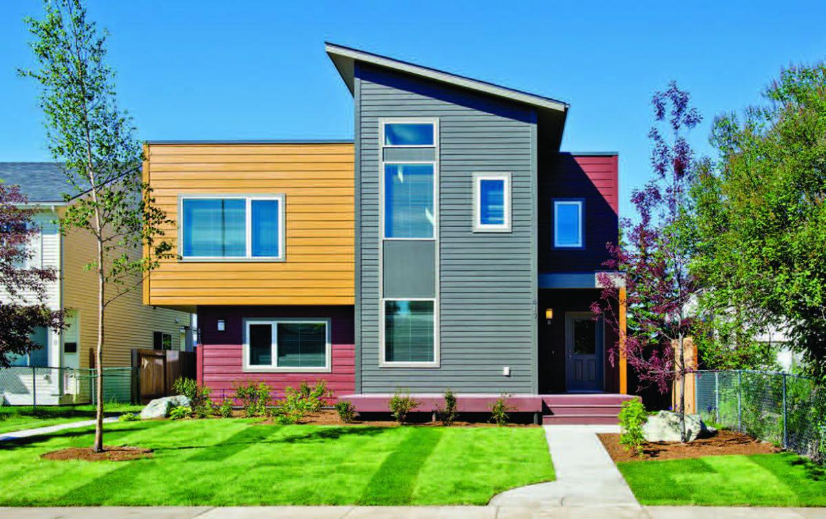 Photo shows a duplex home built using Indian Housing Block Grant funds and Low-Income Housing Tax Credits.