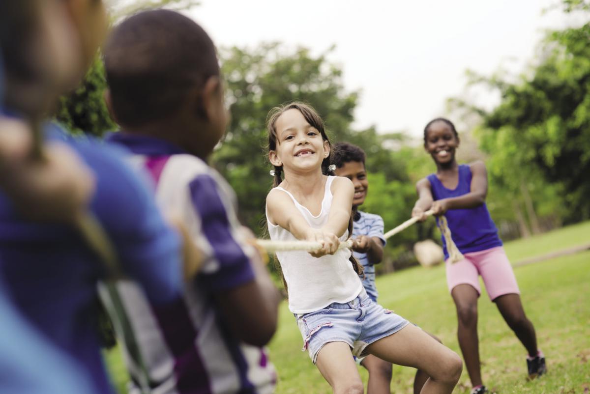 Children playing tug of war. Image