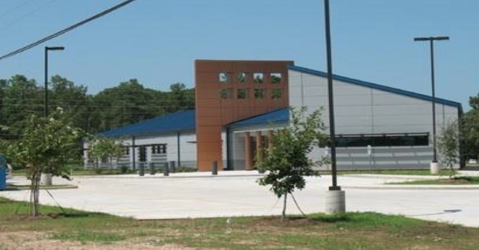 Photograph of the front façade of a one-story office building.