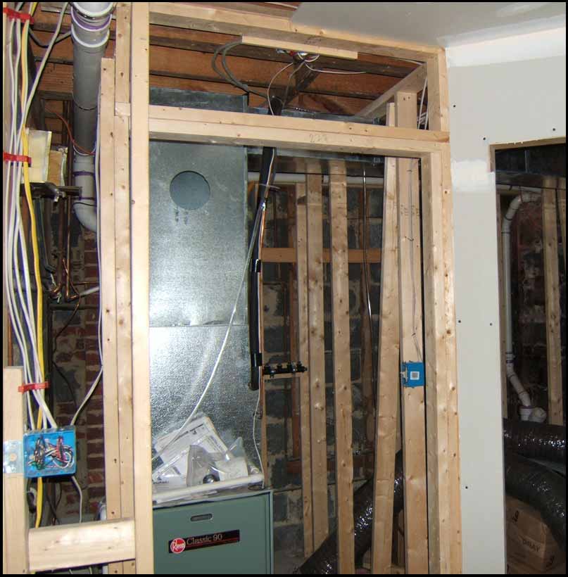 A picture of repairing/upgrading a unit’s HVAC system.