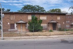Image of the Madden/Wells Homes as they appeared in 2005 before demolition.
