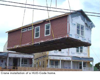 Crane installation of a HUD-Code home.