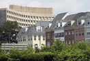 HUD headquarters with townhouses in foreground.