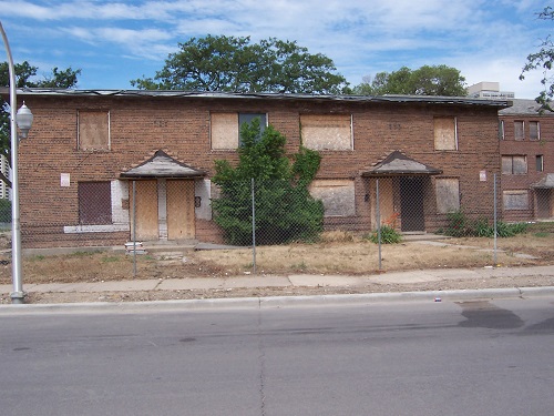 Image of the Madden/Wells Homes as they appeared in 2005 before demolition.