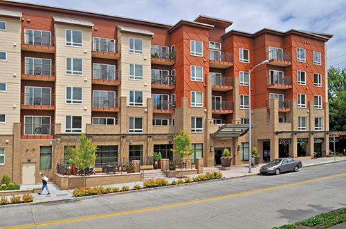 Senior residential complex located near retail shops and public transit is part of a retrofitted suburban mall.