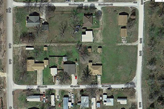 The lot fronts Hawthorne Street and has two mature pecan trees towards the south side. An alley borders the south side. The picture above is a birds-eye view of the lot from Google Earth. 