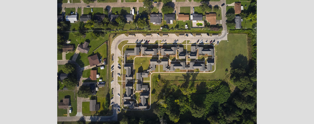 Aerial photograph of The Reserves at Gray Park and surrounding single-family neighborhood.