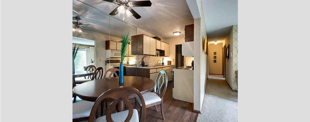 Image of an apartment dining room and kitchen.