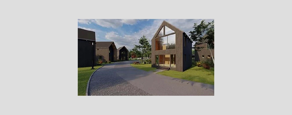 Two-story houses with large, dramatic windows clustered along a curved road. 
