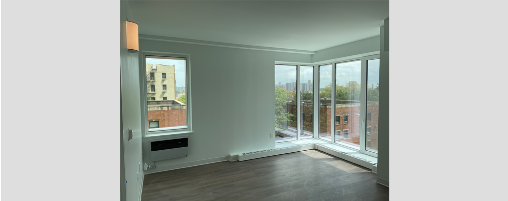 Image of a corner room in a city apartment building.