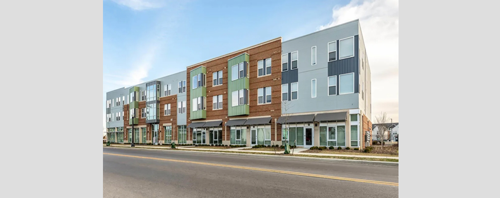 Photograph of a row of two-story townhomes.