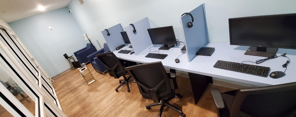 A small computer lab with workstations.