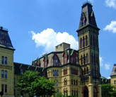 Front view of a midcentury, two-story brick building.