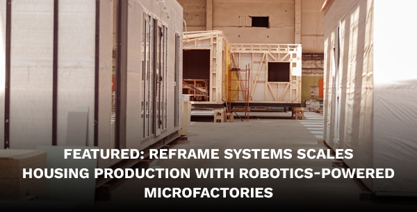 Prefabricated houses under construction in a large building.