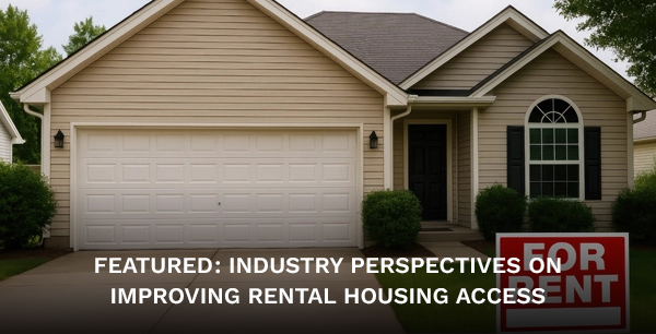 A house with a "For Rent" sign in front.