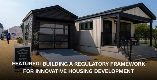 A CrossMod model house on display at the Innovative Housing Showcase. A signboard to the left of the house reads "Nation's First Single Section CrossMod®".