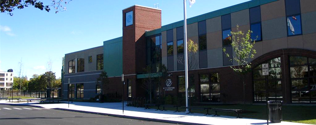 Photograph of the front façade of a two-story institutional building.