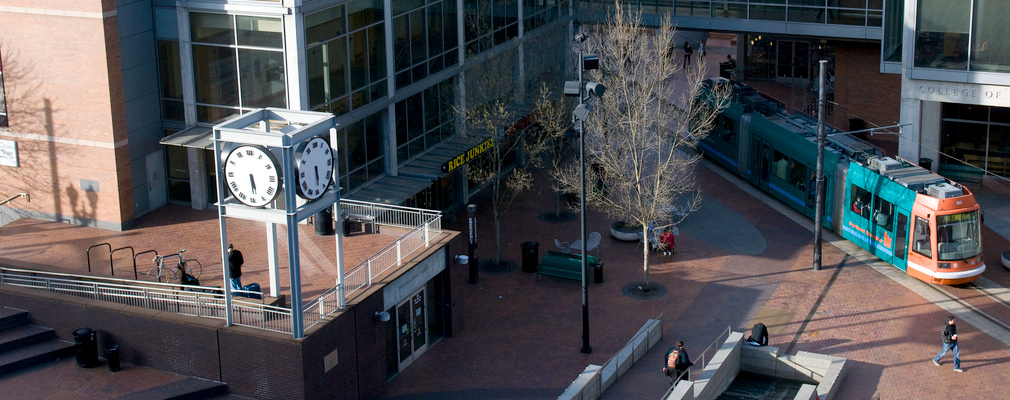 Photograph of PSU’s Urban Plaza with the university’s Academic and Student Recreation Center and the Portland Streetcar line.