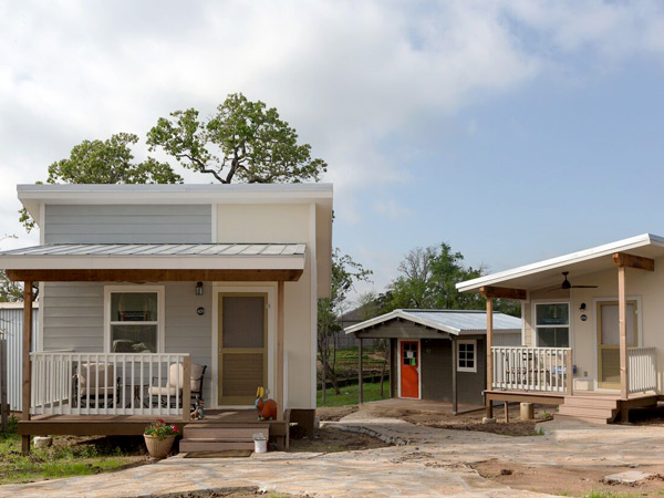 Photograph of three micro houses. 