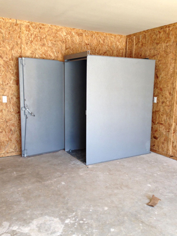 Photograph of a safe room inside a garage.