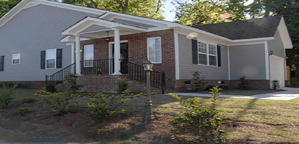 Photograph of a single-story house.