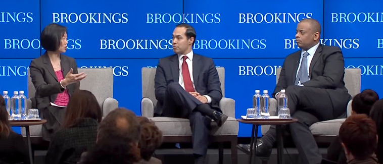 Image showing three individuals, HUD Secretary Julián Castro,  the Brookings Institution's Amy Liu, and Department of Transportation Secretary Anthony Foxx. They are seated in front of an image with the Brookings logo.