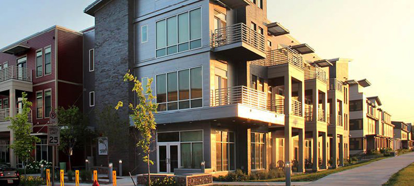 Multi-story residential buildings with balconies.