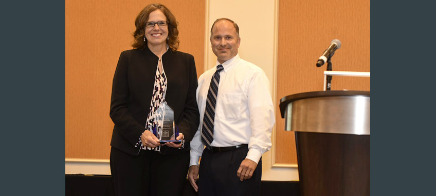 Joan Hansen with OLHCHH Director Matt Ammon