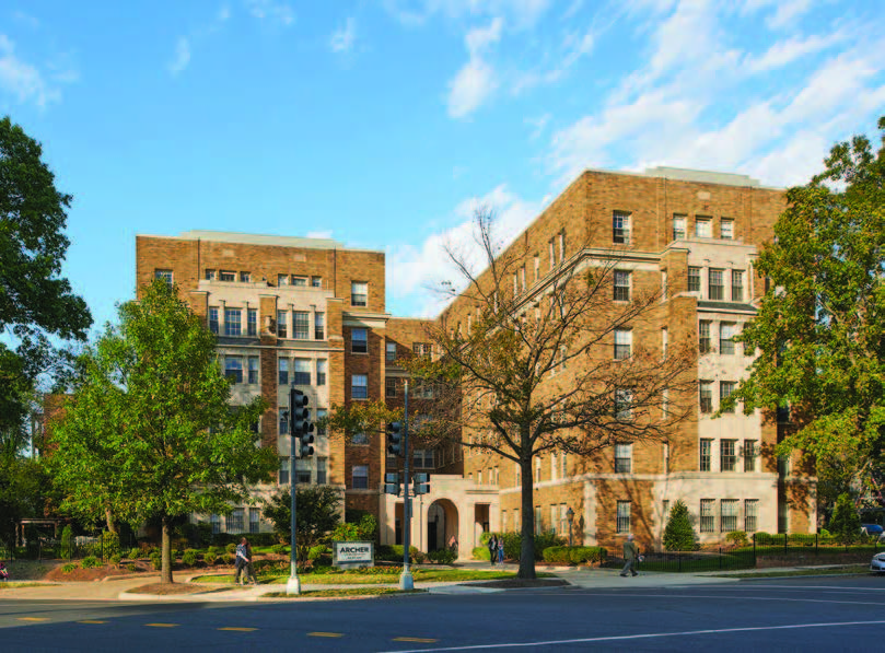 Photo of a six-story brick and concrete building.