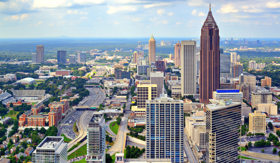 Low-angle photograph of the Interstate 75/Interstate 85 corridor in Midtown Atlanta.