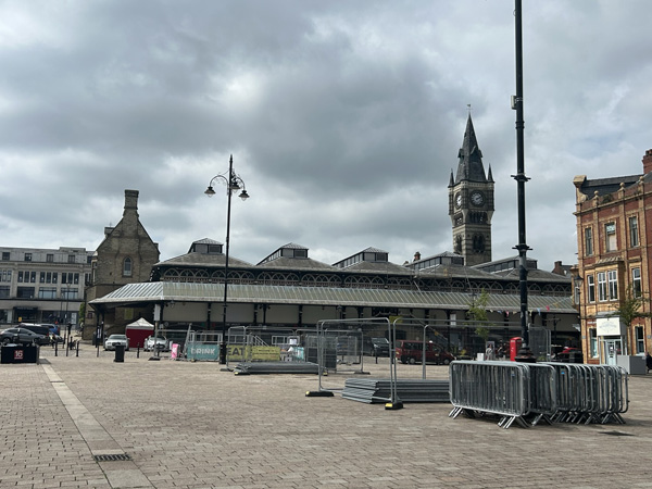 Town center market and plaza, with clock tower in the background.