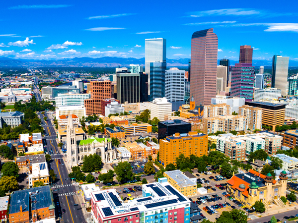 Photo of a Denver, Colorado skyline cityscape.
