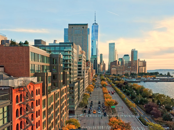Aerial view of Manhattan skyline at sunset.