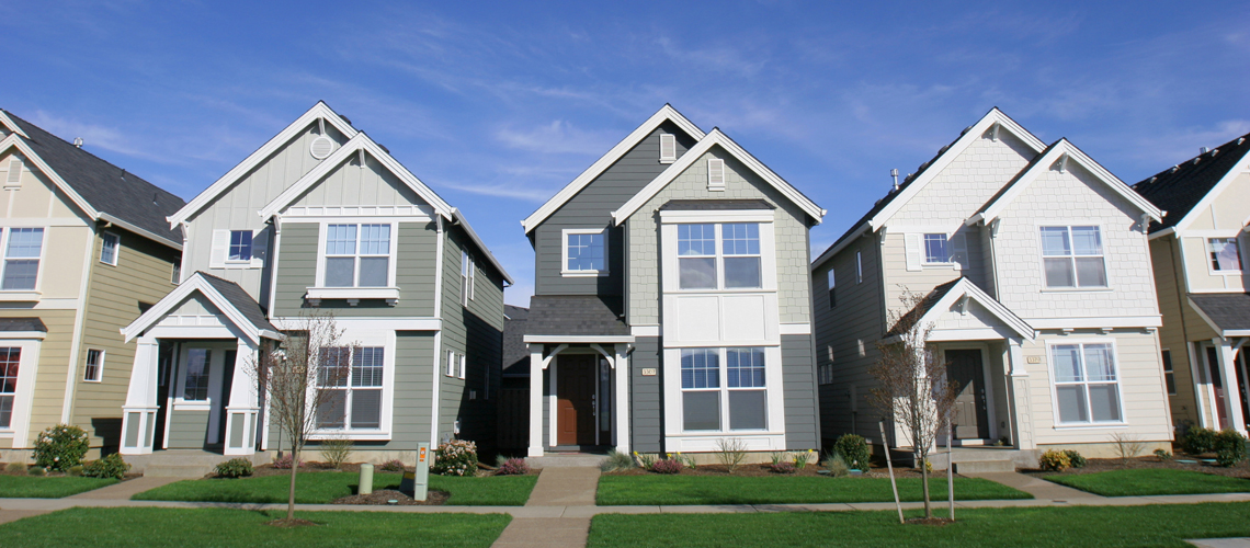 A row of suburban houses. A row of suburban houses.