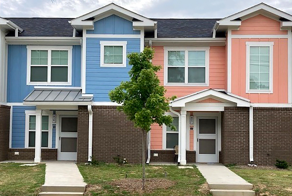 Front view of two two-story houses.