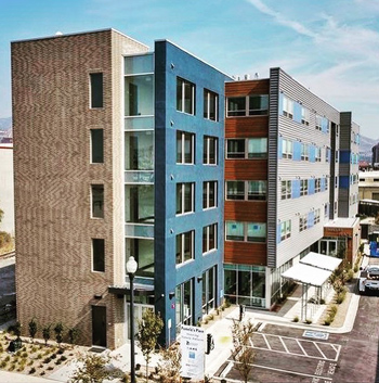 Exterior of a five-story apartment building.