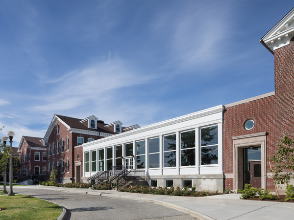 Photo of the two story structure that connects both of the residential wings. 