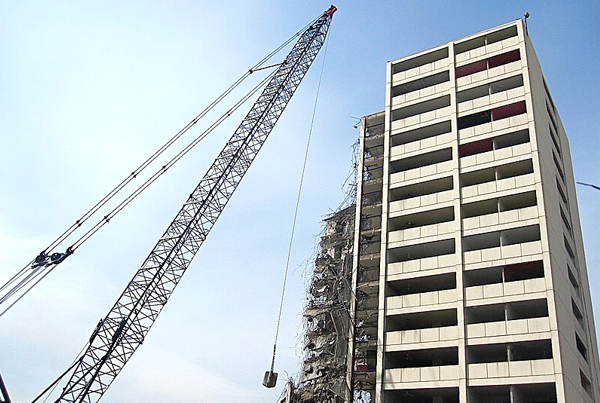 Demolition of the Cabrini-Green housing project in Chicago. https://commons.wikimedia.org/wiki/File:More_Cabrini_Green.jpg License: Creative Commons Attribution-Share Alike 2.0 Generic | Attribution: ChicagoGeek