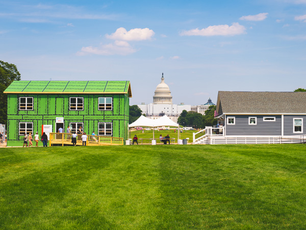 Two demo houses on exhibit at the National Mall.