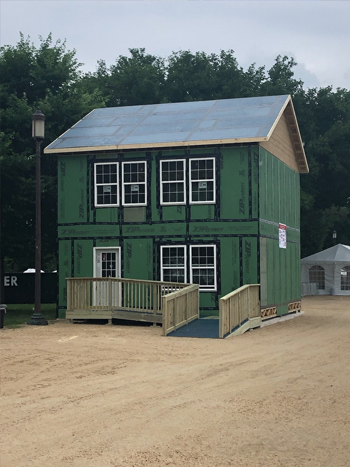 Photo of a full-sized, two-story housing demonstration by the Structural Building Components Association.